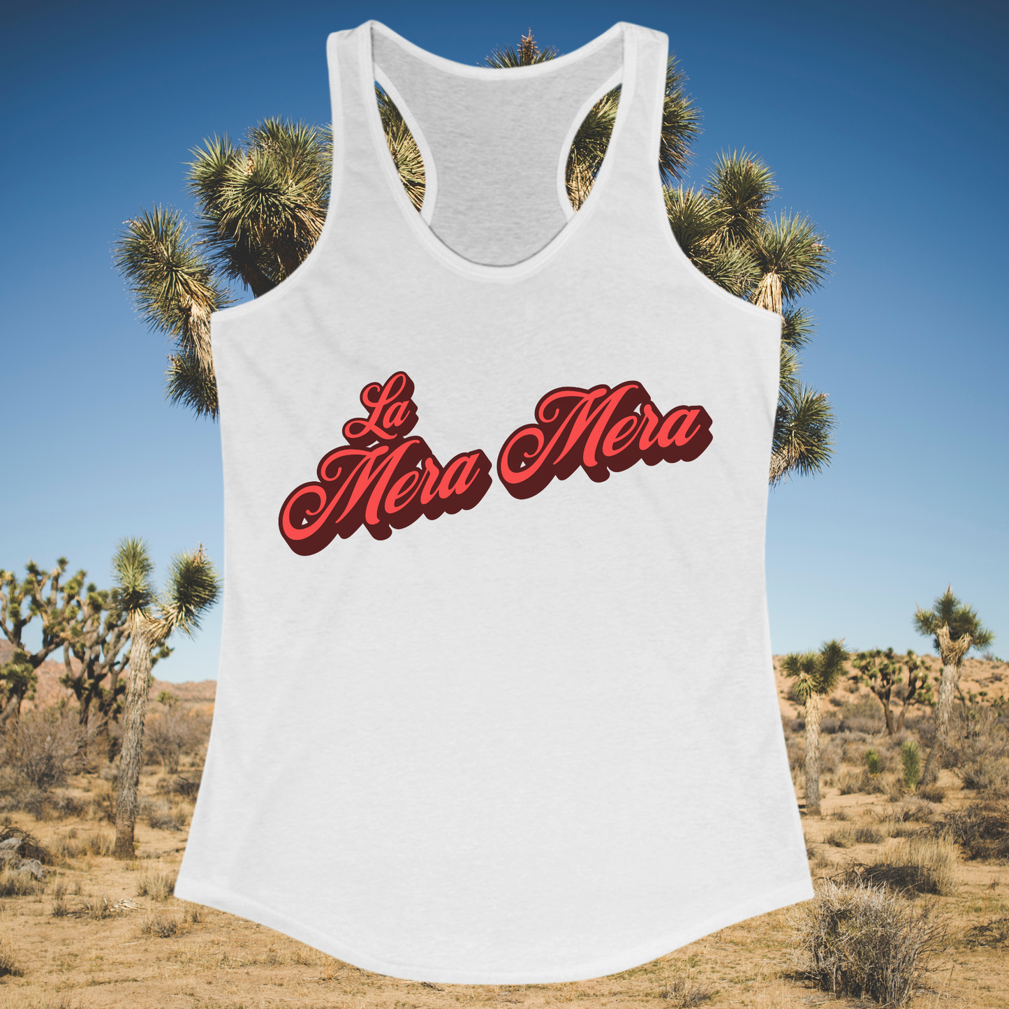 White racerback tank with red script “La Mera Mera” across chest in desert background